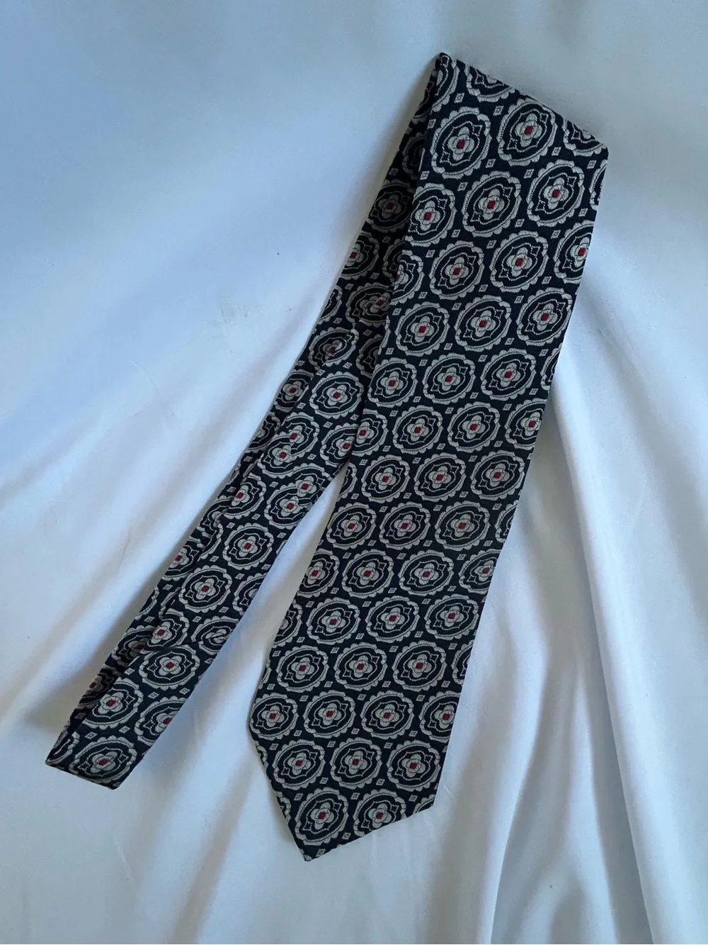 Wembley Black Medallion Pattern Tie with Red Accents